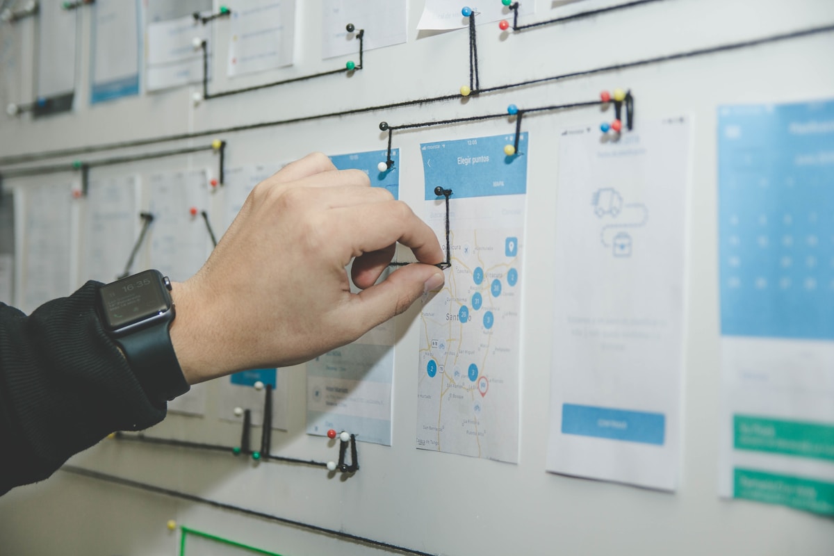 Engineering and venture diligence team auditing software architecture diagrams and technical feasibility